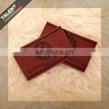 high quality customized private brand name logo jeans genuine leather patch in garment