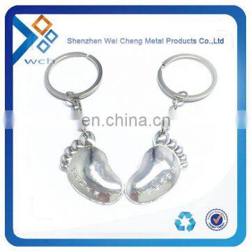 High quality metal couple keychain feet