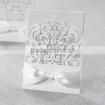 Personalized white laser cut wedding invitations with white ribbons