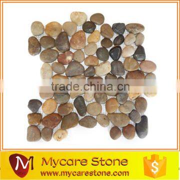 Flat maple color pebble meshed tile