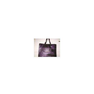 providing      Non--woven     shopping    bags