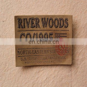 machine embossed leather label