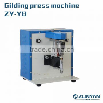 Gilding press machine