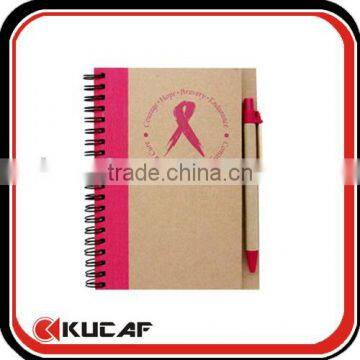 Promotional gift notebook with pen attached