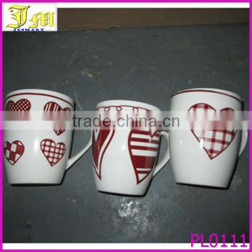 yiwu white ceramic half cup with heart shape