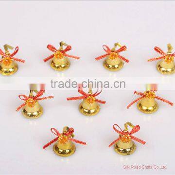 christmas bell decoration with small gold color