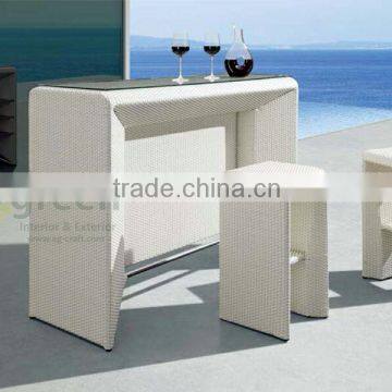 Wicker bar chair and white bar table