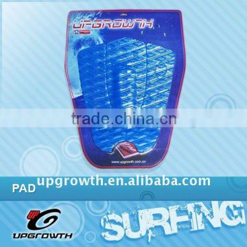 Surfboard deck pad