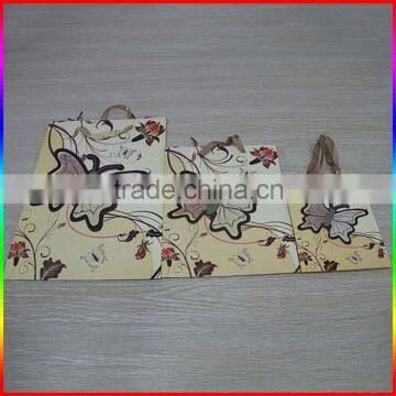 Fashionable Colourful Paper Gift Packing Bag With Butterfly Design photo-2