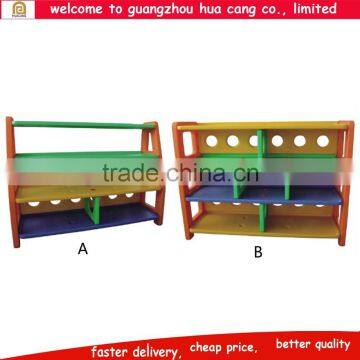 Low price plastic kids shelf for room