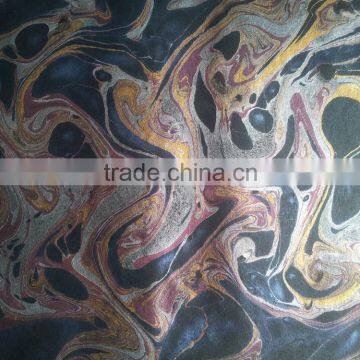 marble printed handmade papers on base black paper with gold and metallic swirls