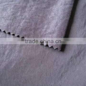 full dull T/N/C fabric with oil cire