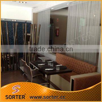 Sorter's wall covering curtain hanging woven wire mesh