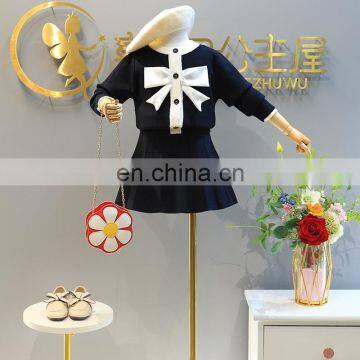 Autumn and winter children's clothing, children's western style knitted skirt suit, fashionable sweater short skirt two-piece