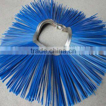 Center brush for street sweeper
