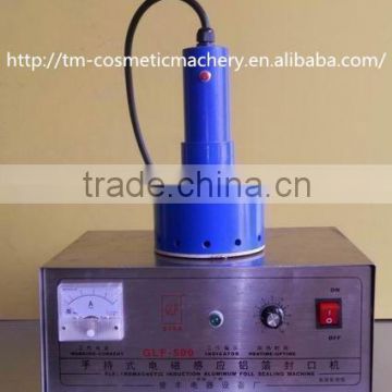 2015 high quality manual easy operated inductor aluminum foil capper machine