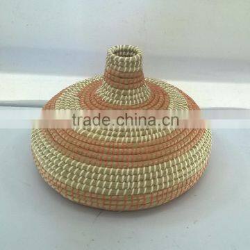 Pink and natural Seagrass handicraft basket