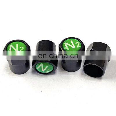 Black Plastic Tire Valve Stem Cap with green N2 Nitrogen logo, Screw-On, Hexagon Design, Insulated, Anti-corrosive