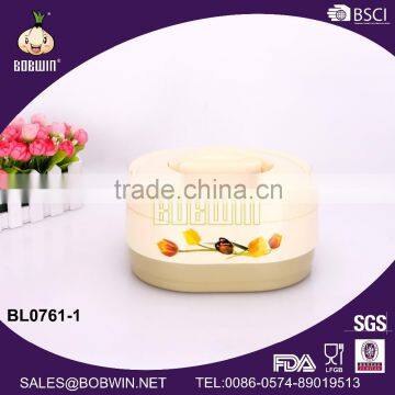 Thermal food carrier with spoon and fork