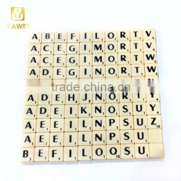 English plastic ivory scrabble tiles