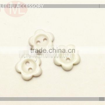 Fancy flower-shaped two holes White plastic buttons for lady garment buttons