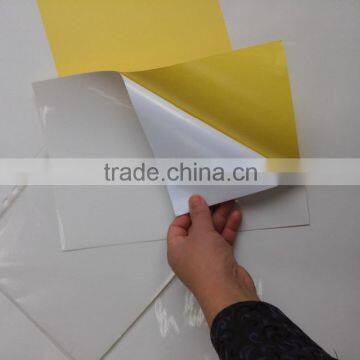 Self adhesive semi gloss coated paper