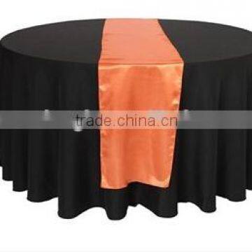 orange satin table runner for events