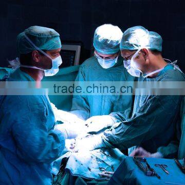 disposable non-woven surgical gown with knit