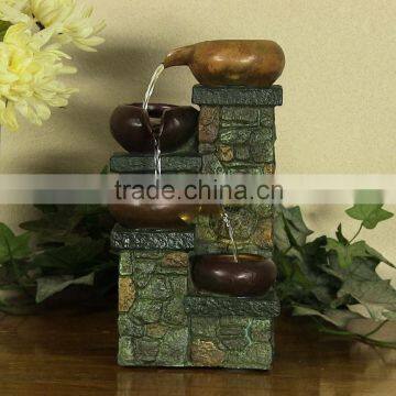 Tierd Pictchers On Brick Steps Tabletop Water Fountain