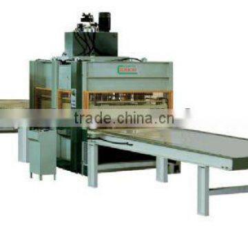 Short cycle laminating machine for melamine facing board