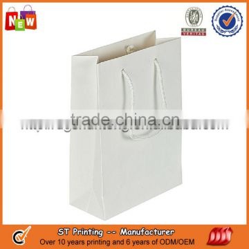 White color paper carrying bag with handle