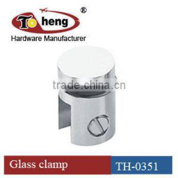 Shower door glass clamp