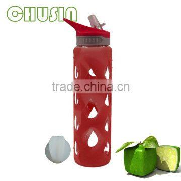 pyrex glass water bottle with food grade rubber silicone sleeve and straw and PP lid