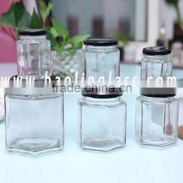 Glass sauce jar with screw caps