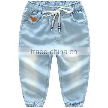 Jeans Supplier in China Low Price 100% Lyocell Kids Jeans Wear With Elastic Leg Opening photo-3