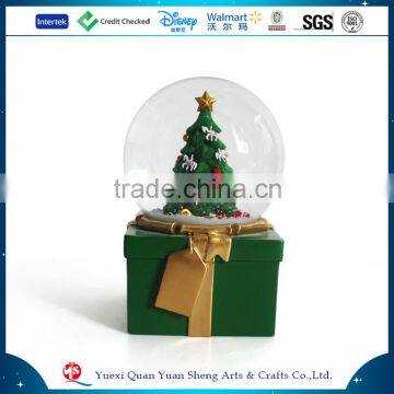 Resin christmas tree snow globe with blowing snow