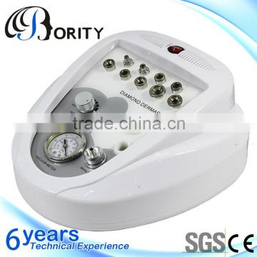 Portable microdermabrasion machine for skin tightening