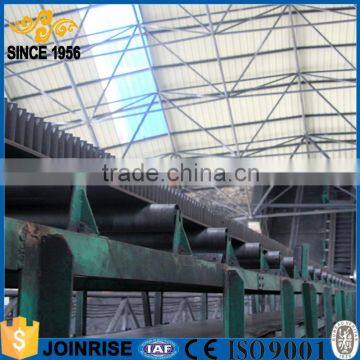 Large angle corrugated guard belt conveyor for bulk material handling