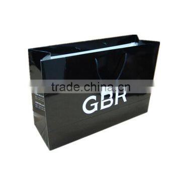 Custom white logo fashion apparel packaging paper bag