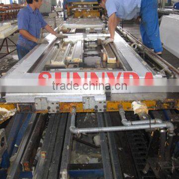 Sandwich panel making machine