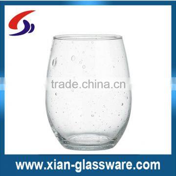 Promotional cheap clear stemless wine glasses with bubbles for wholesale/wine glass cup