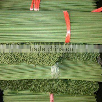 green bamboo flower stick