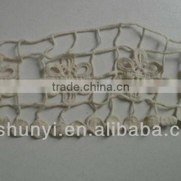 Water-soluble lace embroidered design for garment collar