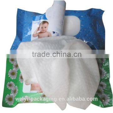 wet tissue bag with adhesive sticker for opening