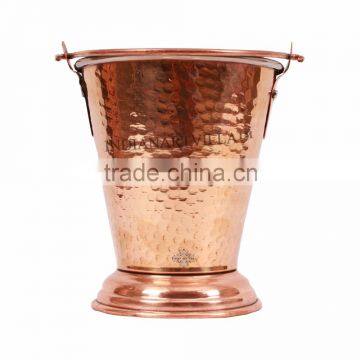 Indian traditional copper steel bucket for a vegetable serving