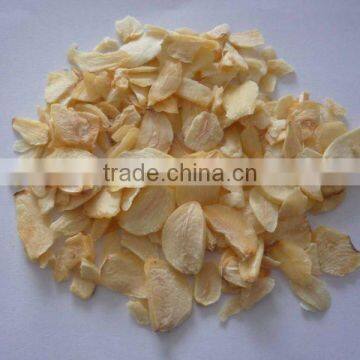 Sell dehydrated garlic flakes with or without root