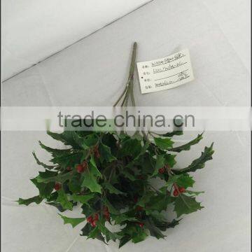 Artificial holly plant branch with red berries for xmas decoration