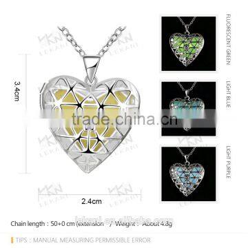 Silver hollow pendants with glow in the dark stone necklace heart shape necklace                        
                                                Quality Choice