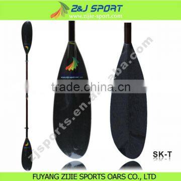 Oval shaft carbon fiber sea kayak paddle