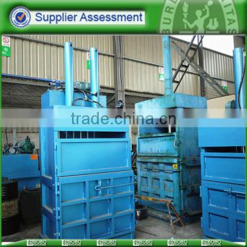 Vertical baler for used clothing